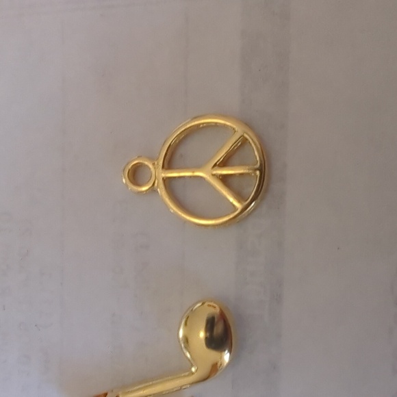 Four gold necklace charms. Peace, music note, little price, and swirl. Charms! - Picture 6 of 8